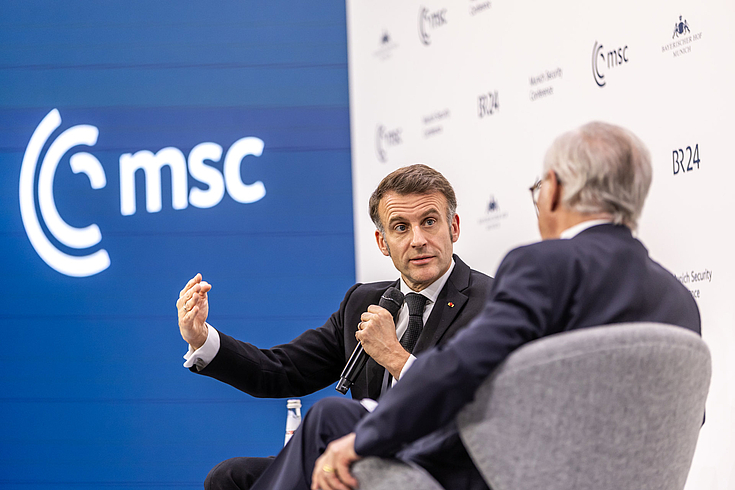 French President Emmanuel Macron in conversation with Wolfgang Ischinger, Chairman of the Munich Security Conference. 