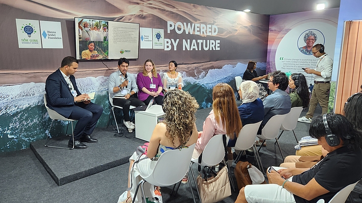 Civil society actors engaging in a UNFCCC COP30 side event to integrate grassroots perspectives into regional and global climate policy