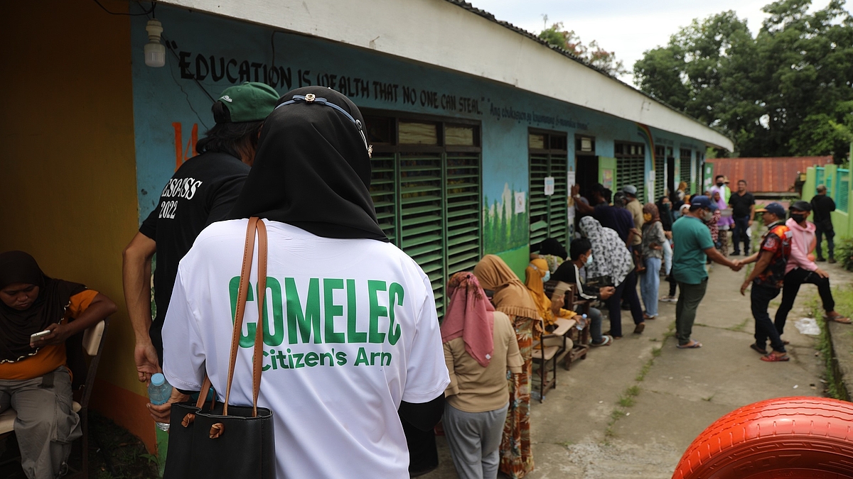 Election watchdogs and civil society volunteers conduct inspection and monitoring in one of the schools where the classrooms are used as voting places for the plebiscite in 2022